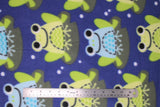 Flat swatch frogs fabric (dark blue fabric with cartoon green and blue frogs on grey lily pads with tossed white bubbles)