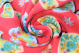 Swirled swatch butterflies fabric (bright medium bubblegum pink fabric with large white, blue, and yellow butterflies with lines of colourful floral pattern within wings, tossed daisy look flowers)