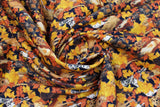 Swirled swatch Fall Puppies fabric (black fabric with busy tossed realistic look dogs allover in various breeds and tossed orange and yellow fall leaves)