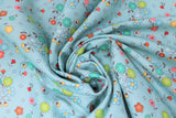 Swirled swatch flowers fabric (teal fabric with tossed tiny cartoon floral clusters with stems in green, teal, red, pink, yellow)