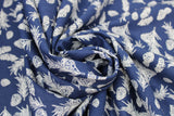 Swirled swatch winter printed fabric in Pinecones on Navy