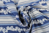 Swirled swatch winter printed fabric in Pinecone Stripes on Navy