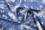 Swirled swatch winter printed fabric in Swallows & Pinecones on Navy
