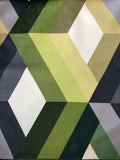 Green and grey bars and off-white diamonds form a cubic optical illusion on this printed upholstery