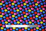 Flat swatch Balloons fabric (black fabric with coloured balloons allover in blue, purple, pink, red, yellow with multicoloured strings)