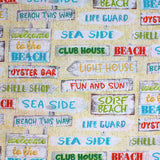 Square swatch Beach Signs fabric (white/beige speckled sand look fabric with busy white board look signs allover in various sizes and shapes with beach related text in various colours allover "Beach" "Sea Side" "Life Guard" etc.)