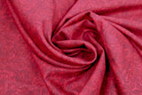 Swirled swatch paisley printed fabric in dark red