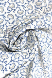 Swirled swatch Blueberry Buckle (and floral) themed fabric in White Flowers