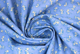 Swirled swatch blue fabric (blue fabric with tiny white cartoon/illustrative style mice tossed allover)