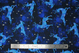Flat swatch Blue Reindeer fabric (dark blue marbled look fabric with tossed light blue marbled reindeer in various poses and tossed sparkly silver metallic effect stars)
