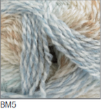 Swatch of Baby Marble DK yarn in shade BM5 (white, tan, pale blue shades)