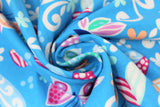 Swirled swatch butterflies fabric (blue fabric with large tossed applique style butterflies, hearts, flower heads, and swirls in white, blue, pink, orange, green, teal, purple)