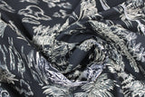 Swirled swatch California themed fabric in White Islands on Black