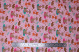 Flat swatch cats fabric (pale pink fabric with tossed cartoon cats in light and dark brown and orange, tossed white, blue, purple and pink floral with green leaves, tossed white heart outlines, small brown mice)