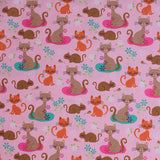 Square swatch cats fabric (pale pink fabric with tossed cartoon cats in light and dark brown and orange, tossed white, blue, purple and pink floral with green leaves, tossed white heart outlines, small brown mice)