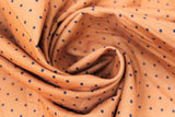 Swirled swatch black & orange dots fabric (medium orange fabric with small black polka dots)