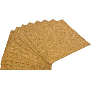 A fan of square cork sheets on a white background