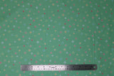 Flat swatch small print fabric in Tiny Stars on Green