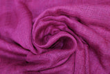 Swirled swatch burgundy sheer fabric with subtle cross hatch effect