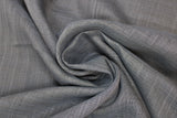 Swirled swatch charcoal grey sheer fabric with subtle cross hatch effect