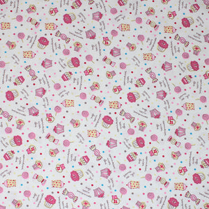 Square swatch cupcakes fabric (white fabric with tossed blue, yellow, light and dark pink polka dots, tossed cartoon cupcakes, candies, and lollipops in pink shades, "oh so sweet" tiny cursive writing, etc.)