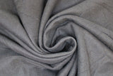 Swirled swatch dark brown flannel fabric