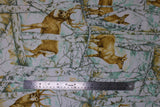 Flat swatch deer fabric (cartoon forest scene in washed green, grey and white, birch trees and greenery with brown male and female deer in various poses)