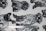 Flat swatch various dogs fabric (white fabric with black detailed sketch dogs in various sizes and breeds)