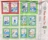 Full panel swatch Dogs Read Too Panel (43" x 36") (panel to make small 10 page dogs read too story book out of fabric, red front and back cover with green background/white daisy printed pages, all have blue framed rectangular image with cartoon dogs and part of the dogs read too story)