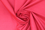 Swirled swatch so ruby fabric (bright cherry red fabric with tiny faint red dots allover)