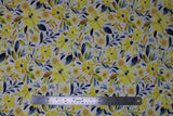 Flat swatch fabric in white (white fabric with busy floral toss design in yellow and grey colourway - tossed floral heads and leaves)