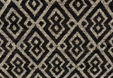 Black colourway of this jacquard geometric pattern with black in a velvety texture and cream for background. Pairs of joined diamonds resembling a mask are outlined by a second line of the same thickness