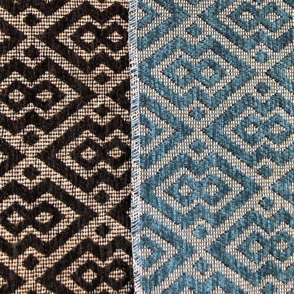 Two colourways of this jacquard geometric pattern with colours in a velvety texture and cream for background.  Pairs of joined diamonds resembling a mask are outlined by a second line of the same thickness