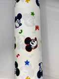 Full roll of Mickey and Minnie Mouse (Licensed) printed fabric in Mickey Heads (small Mickey heads with coloured outlines, tossed colourful letters and stars on white)