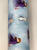 Roll of "Anna and Elsa on blue" frozen characters and forest/leaves on blue