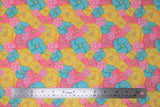 Flat swatch multi colour flowers fabric (brightly coloured floral heads in yellow, pink, and baby blue collaged allover in various sizes)