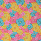 Square swatch multi colour flowers fabric (brightly coloured floral heads in yellow, pink, and baby blue collaged allover in various sizes)