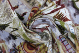 Swirled swatch a good catch fabric (square and rectangular shaped fishing badges collage look fabric with full colour fishing elements including small canoe fishing scene, maps, fish, plaid, lures, etc. "A good catch" text)