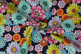Print "Floral Bloom" from the Birds In Paradise collection, twisted to show drape and texture.