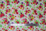 Flat swatch beautiful bouquet fabric (white fabric with small brightly coloured floral bouquet clusters tossed allover in red/pink, purple, prange yellow floral and bright green leaves and greenery)