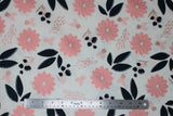 Flat swatch blush fabric (white fabric with large tossed pink and black floral heads, leaves, stems)