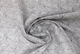 Swirled swatch Ivory Woods fabric (ivory fabric with dark grey leaf outlines in small, medium and large sizes)