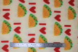 Flat swatch I love tacos fabric (white fabric with red "I <3" text and small taco graphic in orange/green/red repeated)