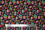 Flat swatch food toss fabric (cartoon/illustrative style food badges in full colour with white borders tossed allover black fabric: fries, cola, donuts, bananas, hamburgers, pizza, fruit, etc.)
