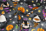 Print "Gnomes - Gray" from the Gnomes Night Out collection, twisted to show drape and texture.
