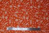 Flat swatch halloween printed fabric in Skeletons on Orange (full skeletons, skulls, bones, and crossbones on orange)