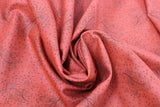 Swirled swatch fabric in Brown Wispy Flowers on Orange