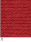 Swatch of Amazon Super Chunky yarn in shade J5 (medium red shade)