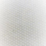 Swatch of white fabric with regular rows of tiny white latex dots.