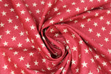 Swirled swatch fabric in Beige Stars on Red
